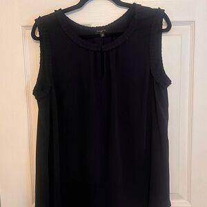 Navy blue top with detailed neck and sleeve